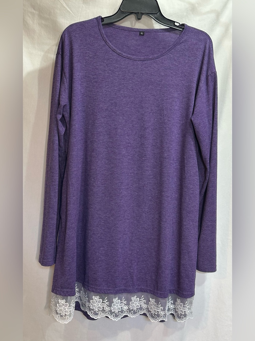 Purple Long-Sleeve Tunic Top with Lace Hem. 
Also has pockets.